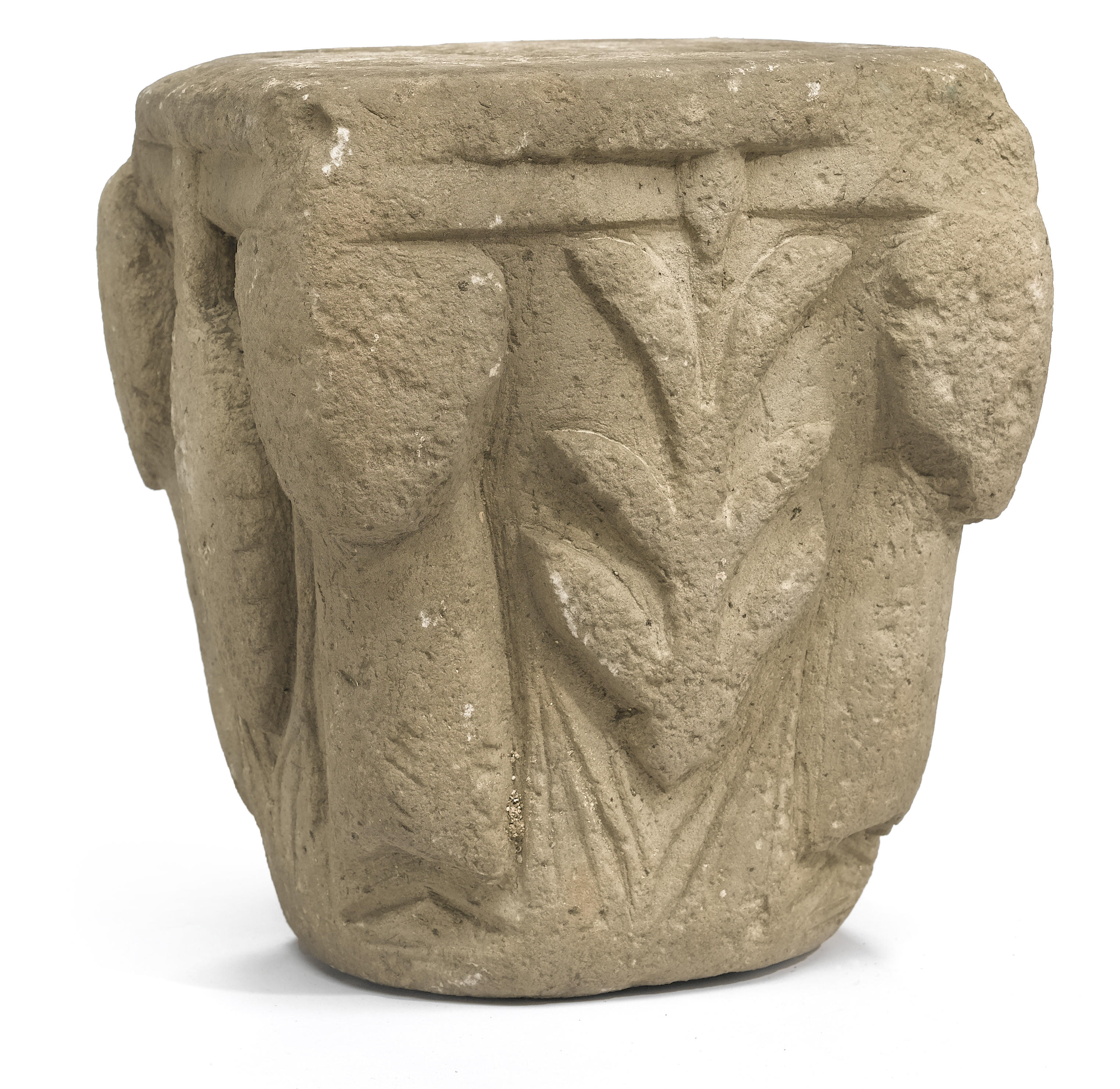 A Romanesque carved stone capital