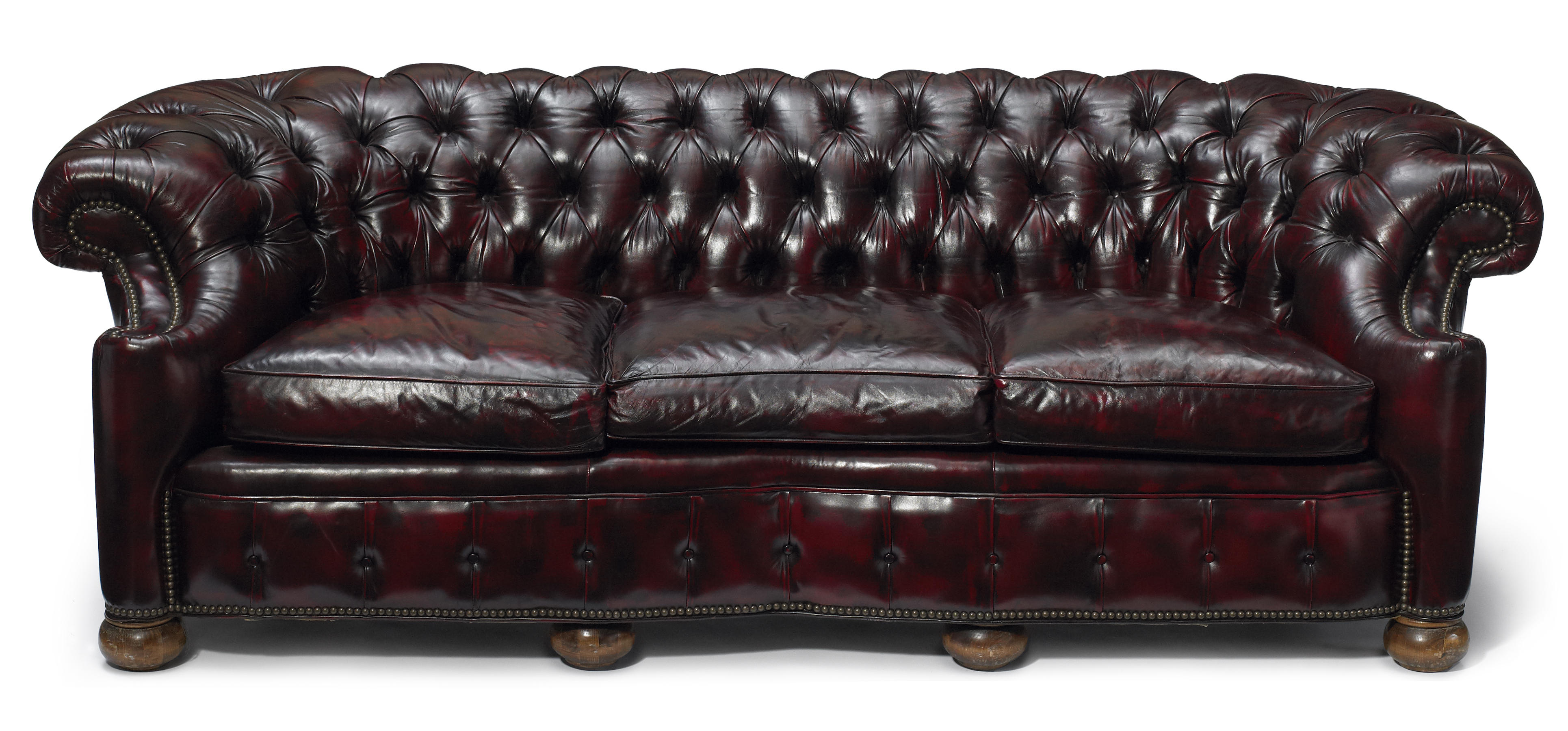 A nailhead and tufted red leather 12ad86