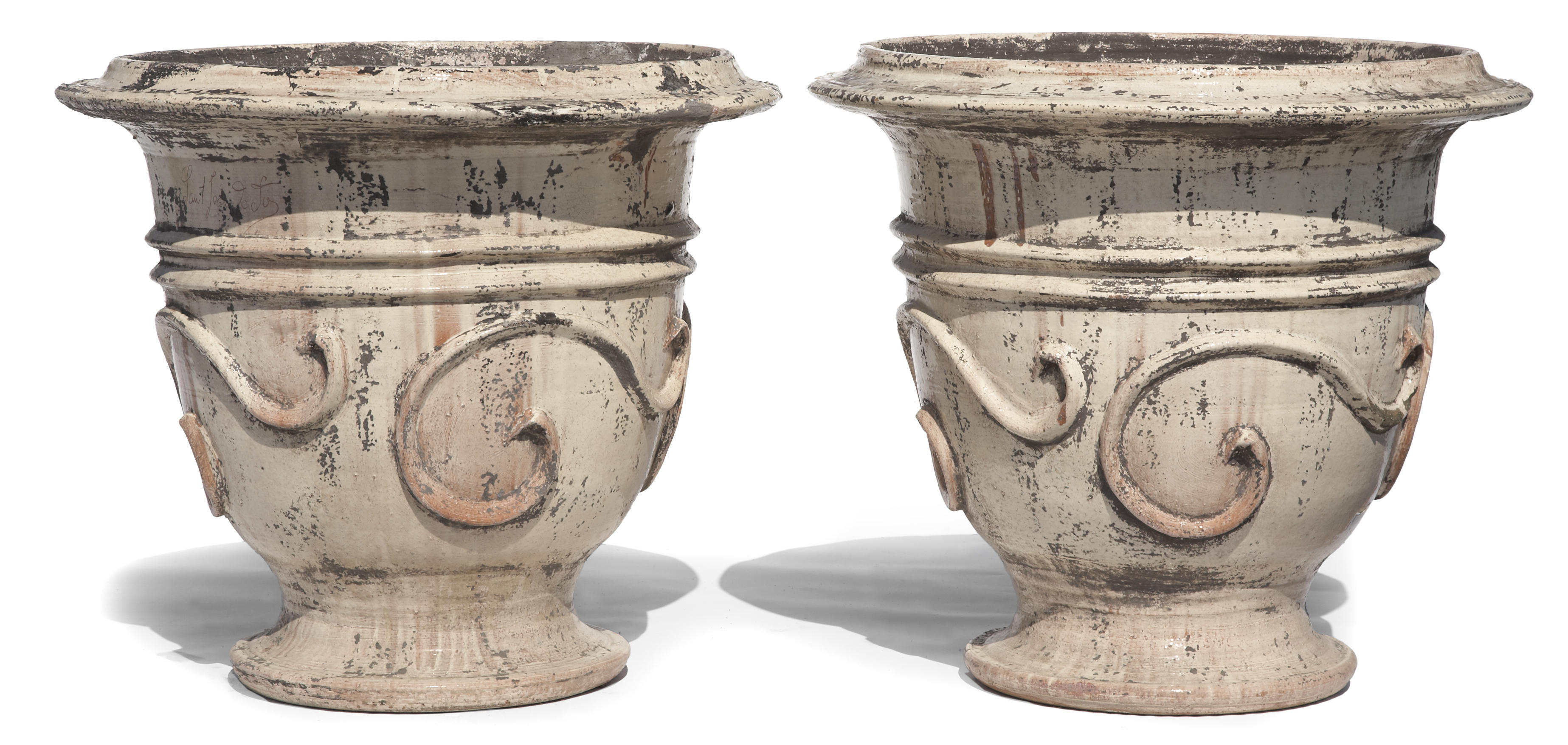 A pair of glazed earthenware jardinires