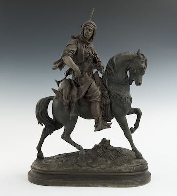 A Patinated Spelter Sculpture of an