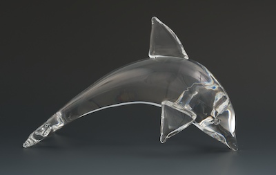 A Steuben Glass Porpoise Figure A clear