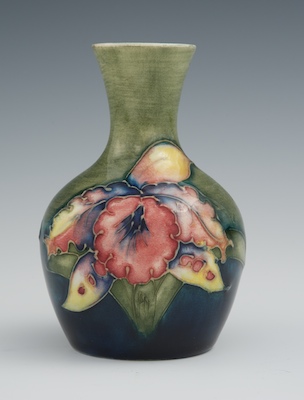 A Moorcroft Orchid Design Glazed Ceramic
