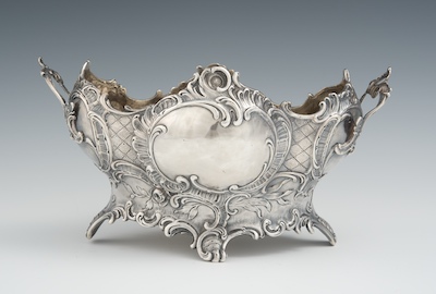 A Sterling Silver Rococo Style Handled