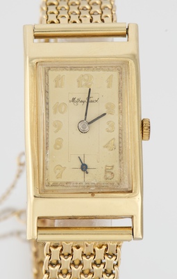 A Ladies Mothey Tissot Gold Watch and