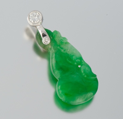 A Carved Jadeite and Diamond Pendant