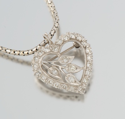 A Ladies' Diamond Heart Pendant