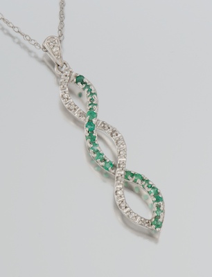 A Ladies Diamond and Emerald Pendant