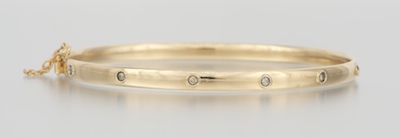 A Ladies' Bangle Bracelet with