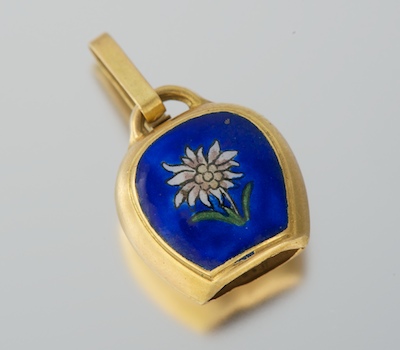 An 18k Gold and Enamel Charm 18k