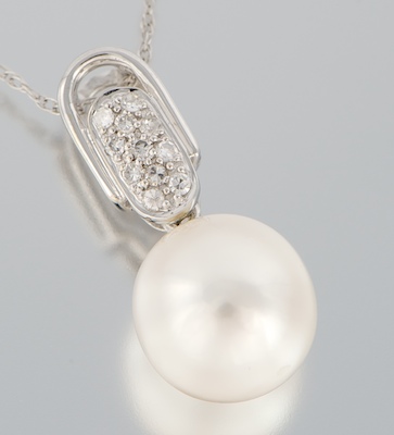 A Ladies' Pearl and Diamond Pendant