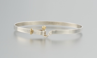 A Sterling Silver and 18k Gold