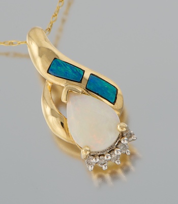 A Ladies Opal and Diamond Pendant 13255e