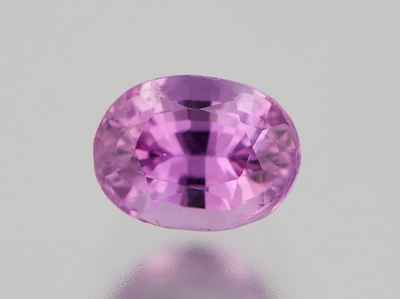 An Unmounted Fancy Pink Sapphire 13258c