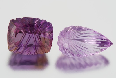 Two Unmounted Concave Cut Amethysts 13258e