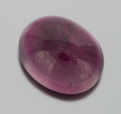 An Unmounted Rubellite Cabochon