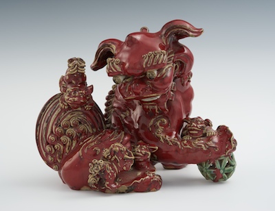 A Large Glazed Earthenware Foo Lion