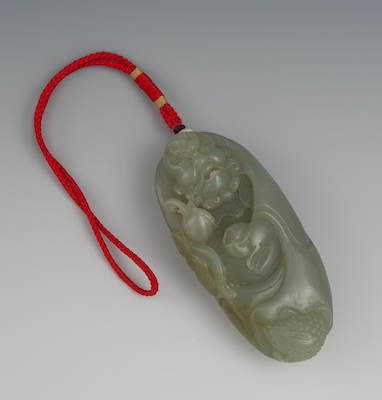 A Chinese Carved Jade Immortal