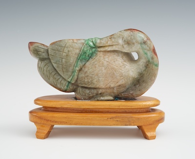 A Carved Jade Duck with Wood Stand