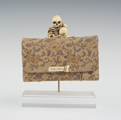 A Carved Skeleton Mounted Tobacco 132625