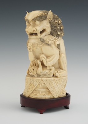 A Large Chinese Carved Ivory Foo