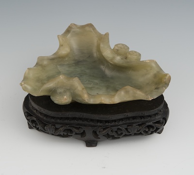 A Chinese Carved Hardstone Leaf