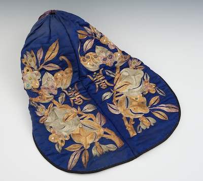 A Chinese Embroidered Wind Hat