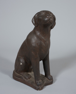 A Garden Statue of a Labrador Pup