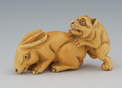 A Carved Ivory Netsuke of a Rabbit 13287d