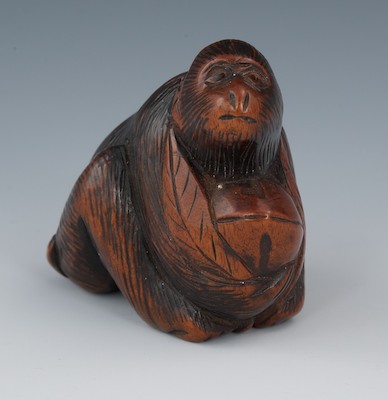 A Carved Wood Netsuke of a Monkey 132886