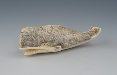 A Carved Ivory Netsuke of a Sperm