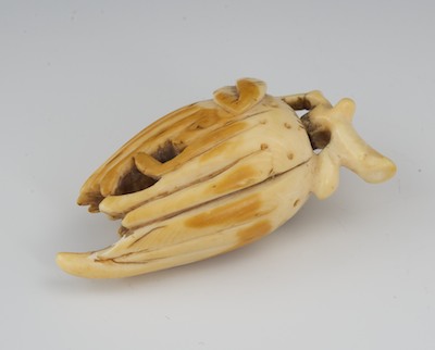 A Carved Ivory Netsuke of a Buddha 13288e