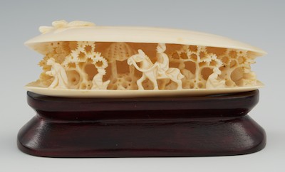 A Carved Ivory Clam Shell with