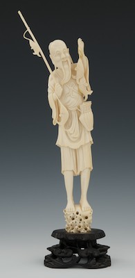 Carved Ivory Fisherman with Catch Standing