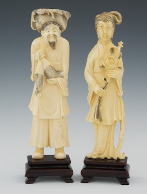 A Pair of Carved Ivory Figures Both