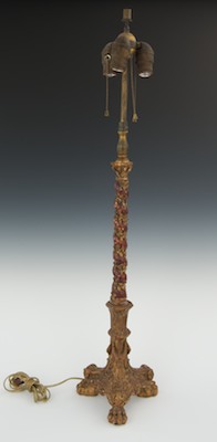 A Carved Wood Painted and Gilt