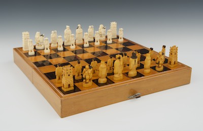 A Chinese Carved Ivory Chess Set