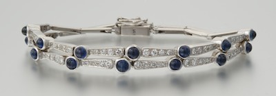 A Set of Two Diamond and Sapphire 1329b8