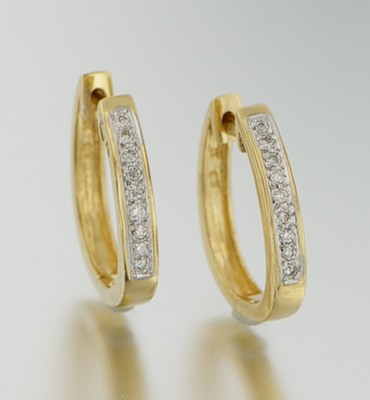 A Pair of Diamond Hoop Earrings 132a16
