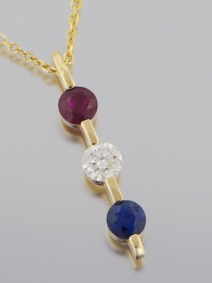 A Ladies' Ruby Diamond and Sapphire