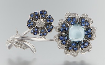 A Sapphire Gold and Diamond Floral
