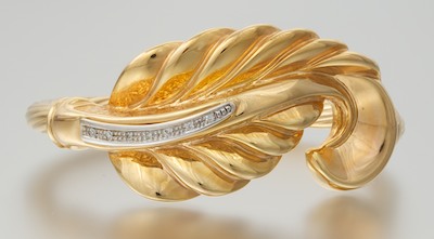 A Gold and Diamond Bracelet Signed