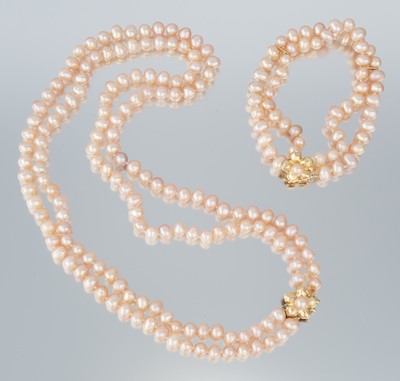 A Pink Pearl Necklace and Bracelet