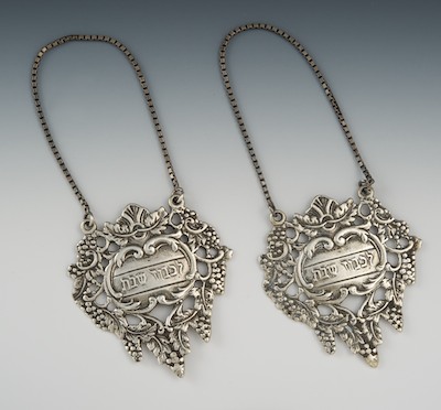 A Pair of Silver Wine Labels with