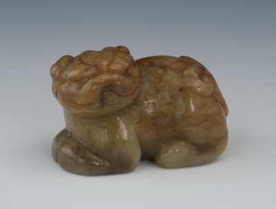 A Chinese Carved Jade Foo Dog Brown