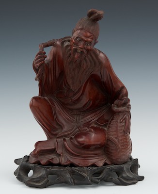 A Carved Wood Figure of a Seated 132c37