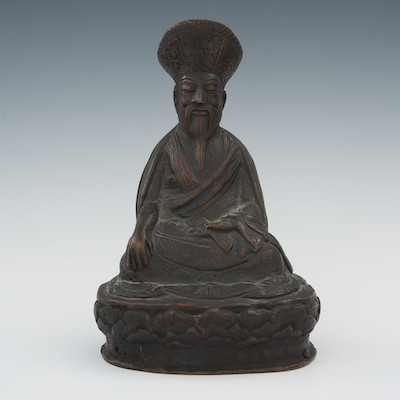 A Hollow Cast Bronze Figure of a Seated