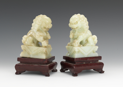 A Pair of Jade Foo Dogs Both of the