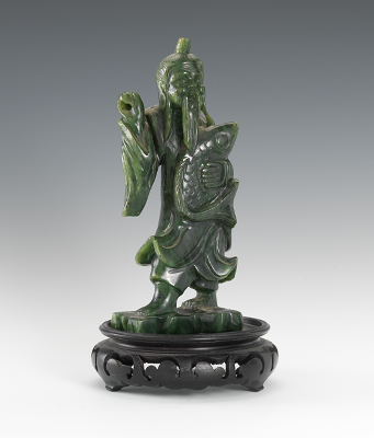 A Spinach Jade Figure of a Man