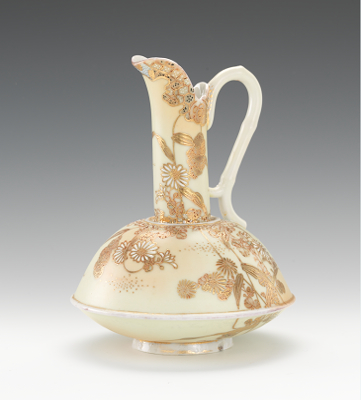 A Nippon Porcelain Moriage Ewer Decorated