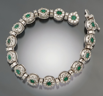 A Ladies' Diamond and Emerald Floret